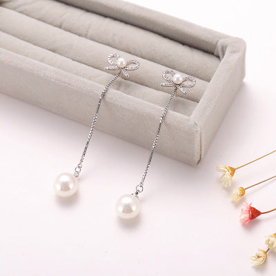 Silver Bow Pearl Drop Earrings