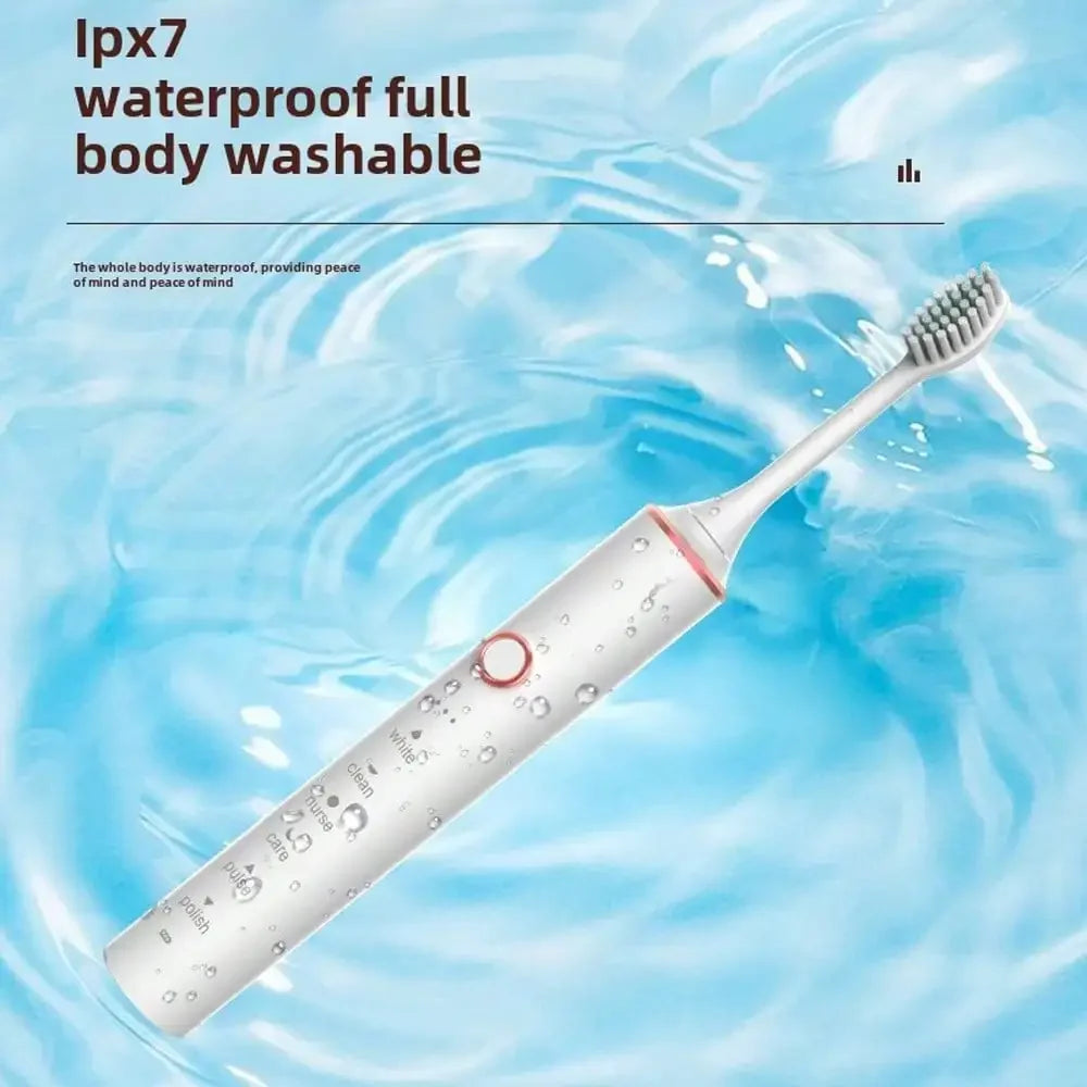 Elektrische Zahnbürste mit weichen Borsten und USB-Anschluss