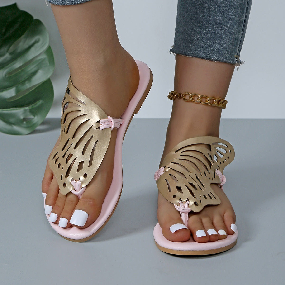 Flip-Flop-Sandalen mit Schmetterlings-Design